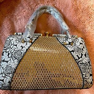 Rise printed textured handbag